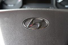 四川现代 创虎XCIENT重卡 440马力 8X4 6.5米自卸车(CHM3310KPQ64M)