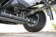 四川现代 创虎XCIENT重卡 410马力 8X4 9.3米排半载货车底盘(CHM1310KPQ80M)