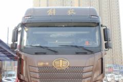 青岛解放 JH6重卡 460马力 8X4 9.5米仓栅式载货车(CA5310CCYP25K2L7T4E5A80)